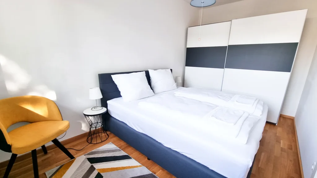 Wein Suite in Mörbisch am See: Schlafzimmer mit Doppelbett
